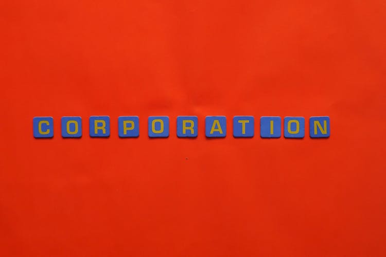 The Word Corporation With A Red Background