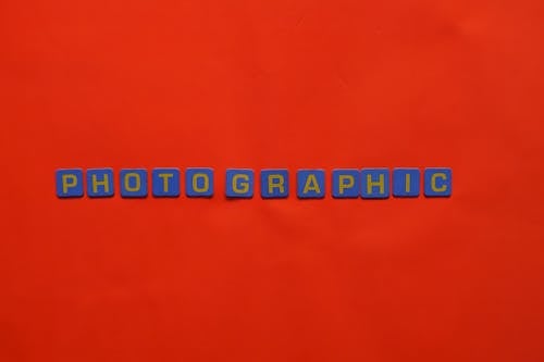 The Word Photographic with a Red Background