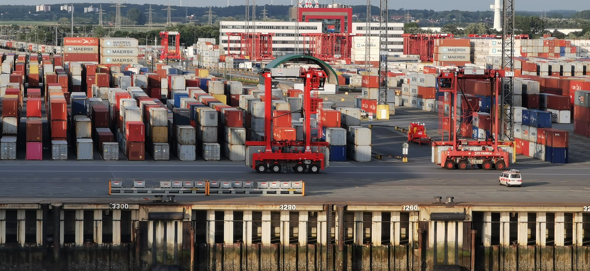 Aerial shot of cargo containers and cranes at Bremerhaven port, Germany.