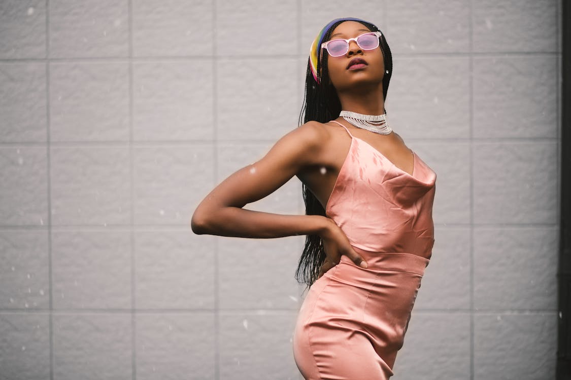 Free Woman Wearing Orange Sleeveless Dress Stock Photo