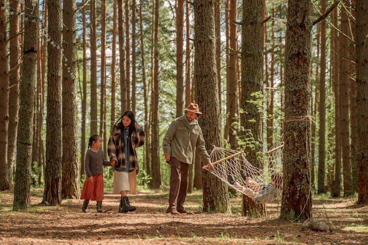 Photo Of A Family Enjoying At Camping Site