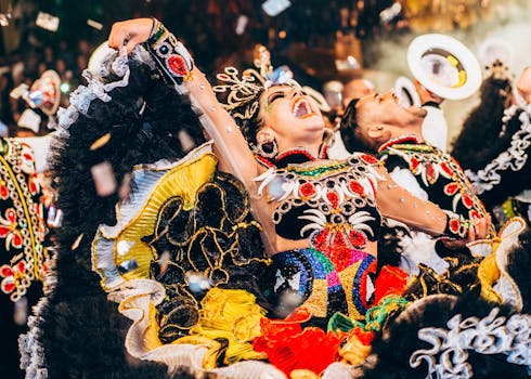 Energetic dancers in colorful traditional costumes performing at a festival in Campina Grande, Brazil.
