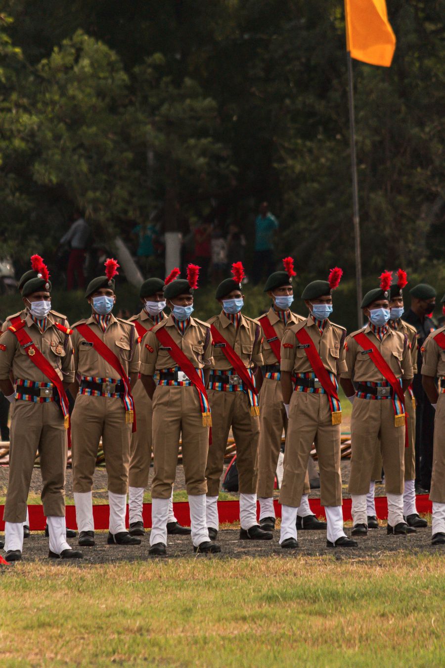 Cadets in uniform at an outdoor parade ceremony