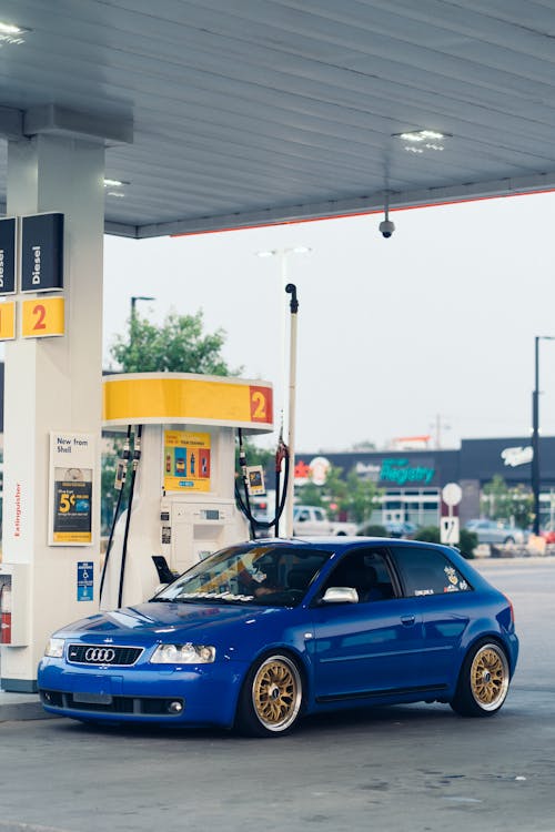 Free Blue Car Parked on Gas Station Stock Photo