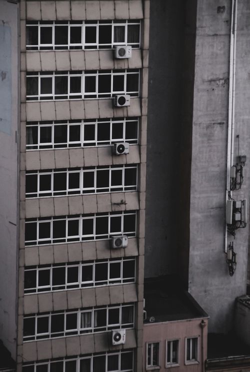 Free Detailed view of a modern highrise with air conditioning units. Stock Photo