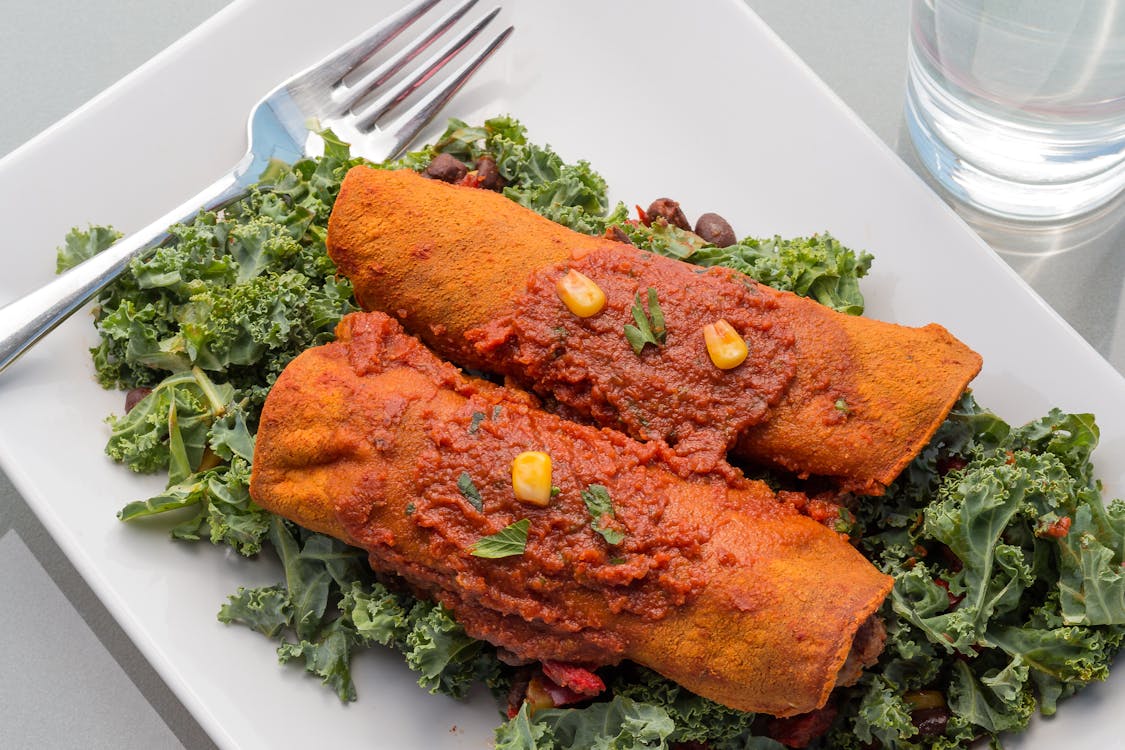 Make Vegan Enchiladas recipe at home with simple-recipes. A delicious and healthy dish, ready in under 40 minutes. Perfect for plant-based diets.