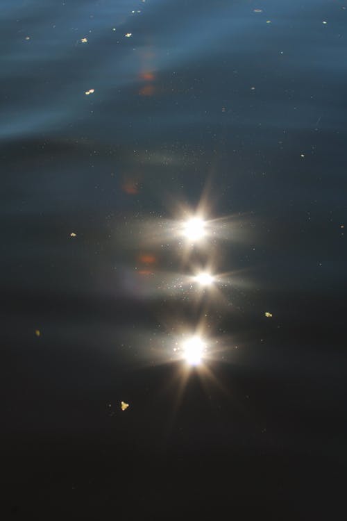 Free A Bright Light Reflections in the Water Stock Photo