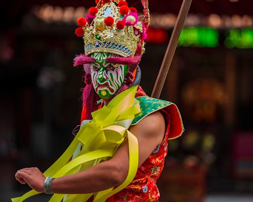 A Person Wearing a Mask in Celebration of a Festival