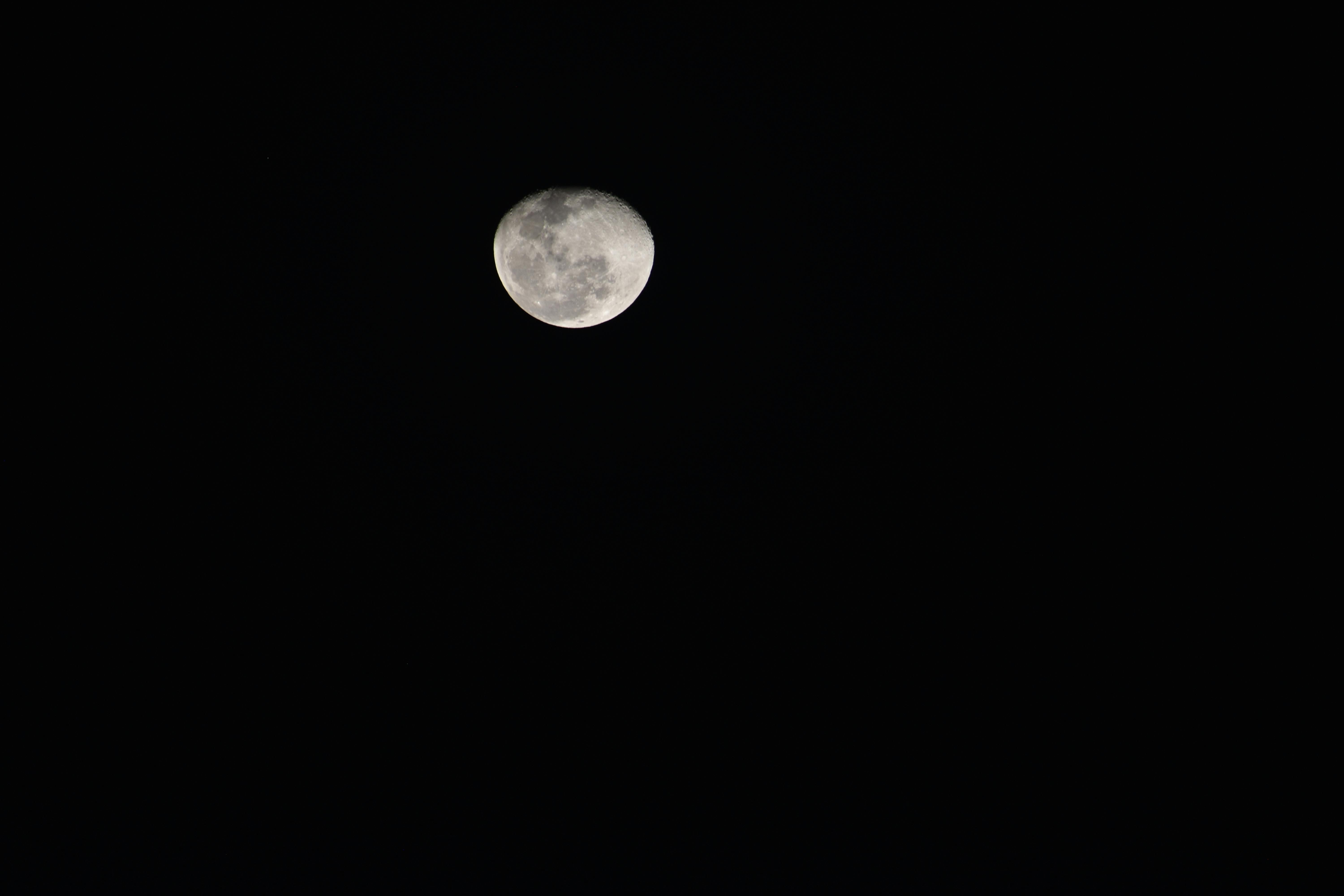 Elevated Water Tank Under Full Moon · Free Stock Photo