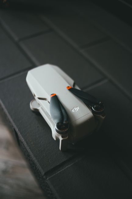 DJI Mini 3 Pro compact drone in flight