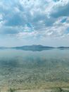 A Lake under a Cloudy Sky