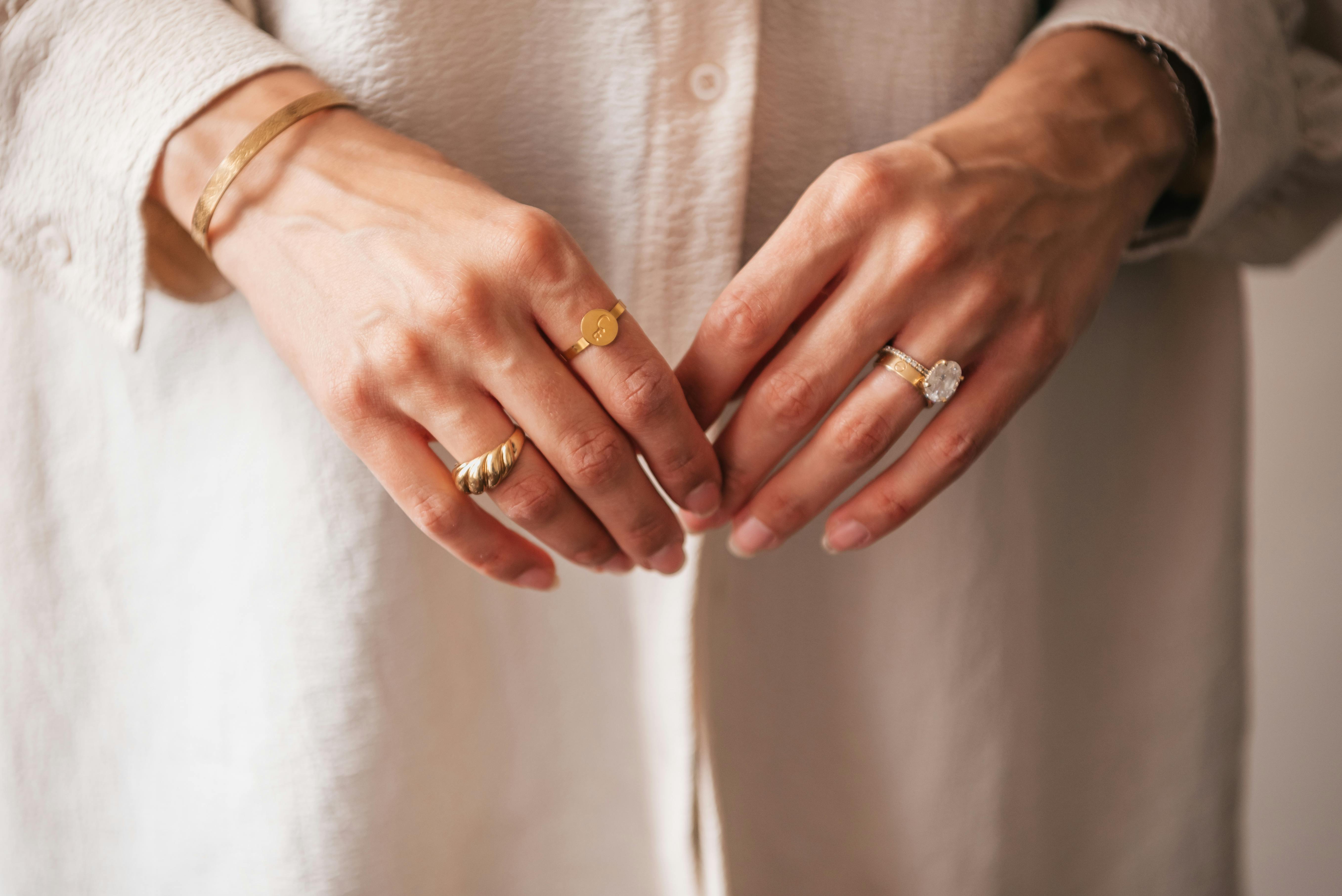 woman wearing rings