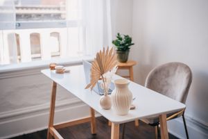 Bright desk beside a window, photo by PNW Production on Pexels
