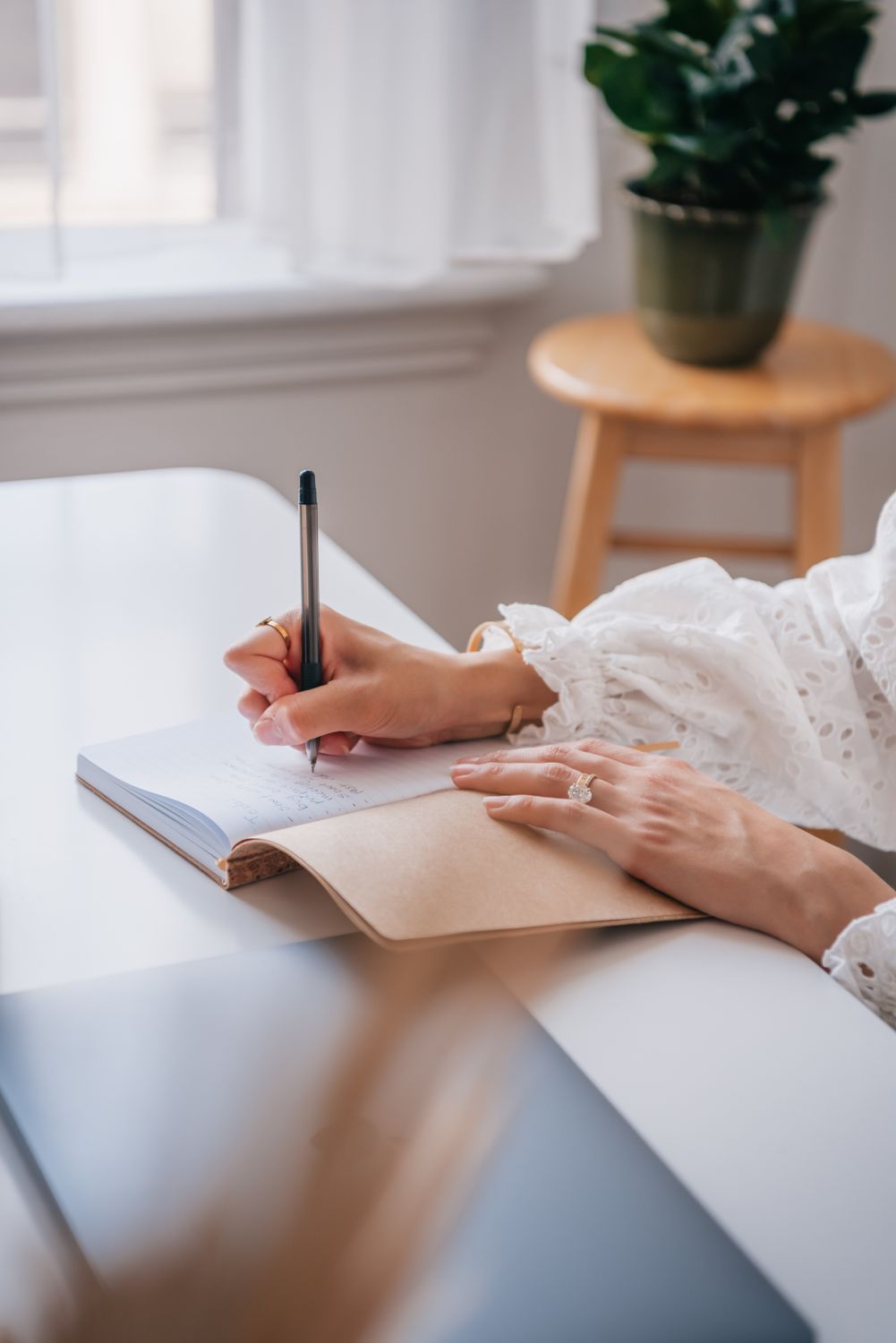 Person With Notebook Person Writing on Notebook with a Pen · Free Stock Photo