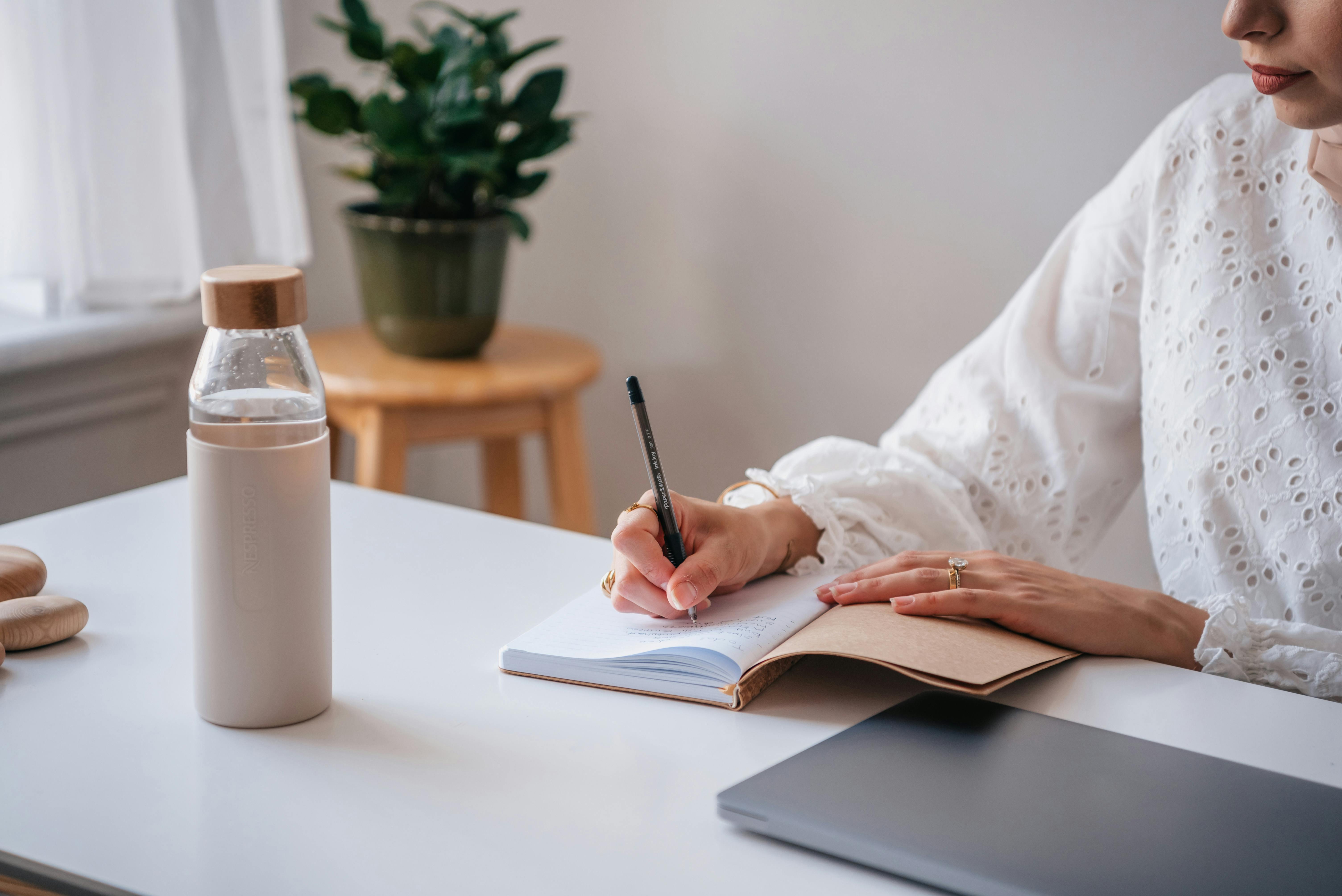 photo of a person taking notes