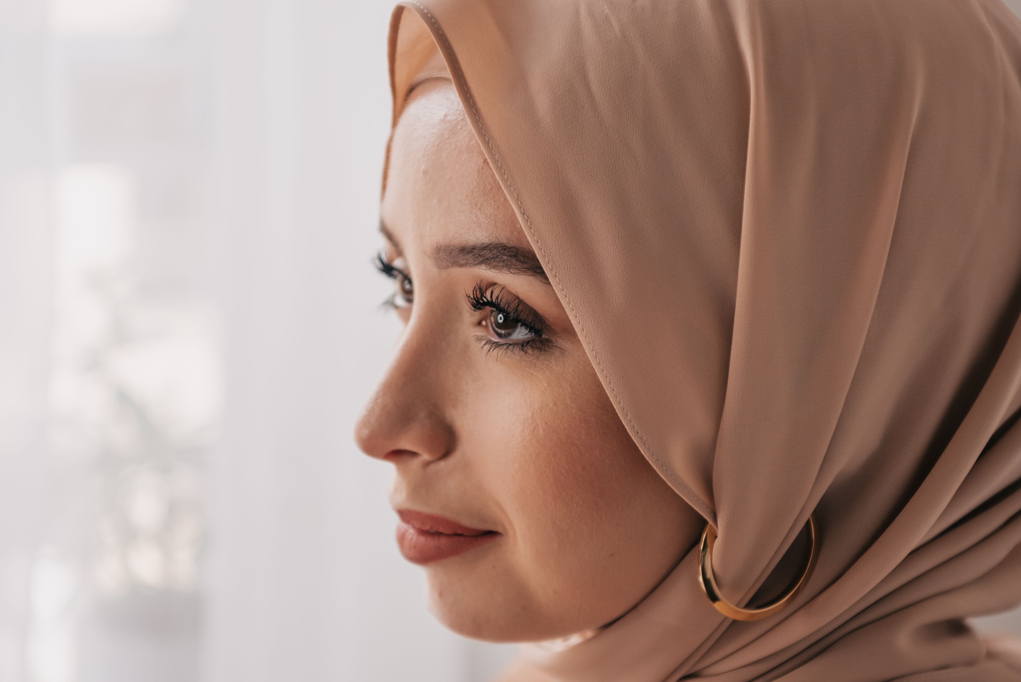 A Woman in Brown Hijab in Close-Up Photography · Free Stock Photo