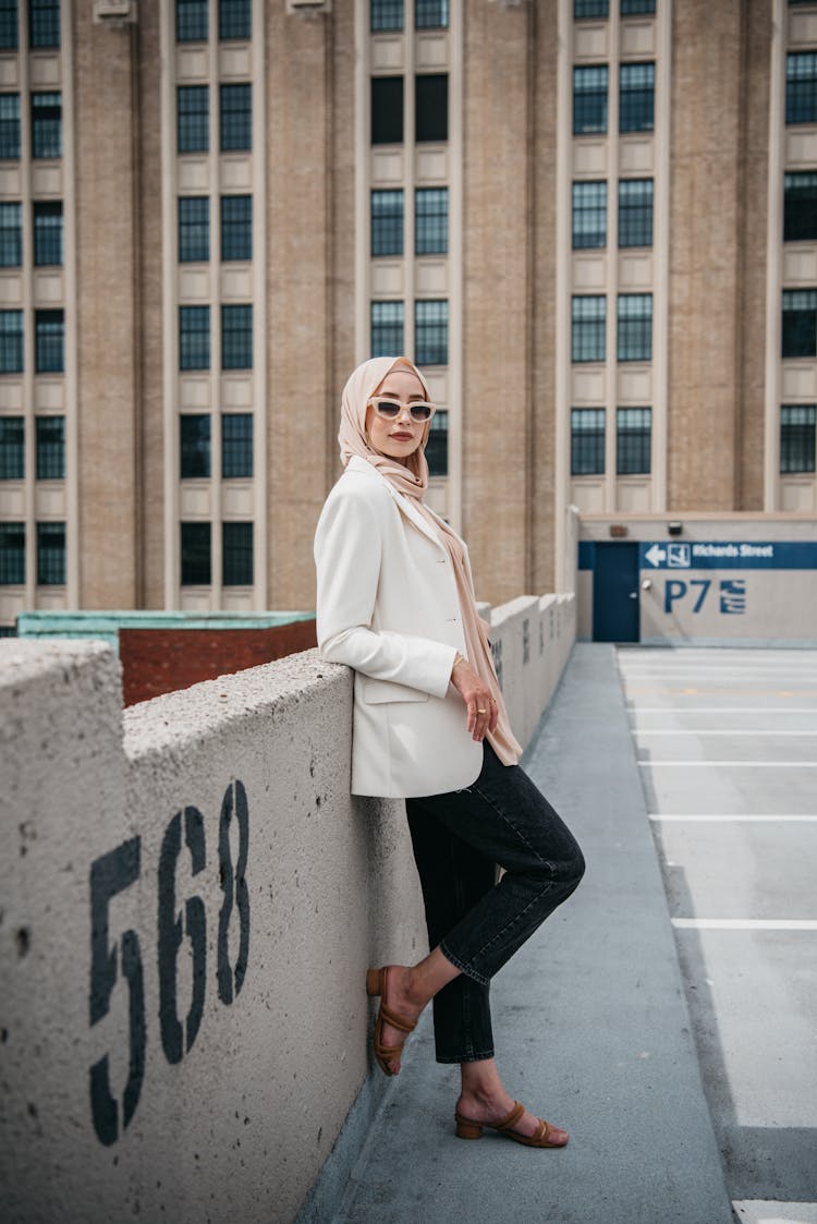 A Woman With A Hijab Wearing Sunglasses