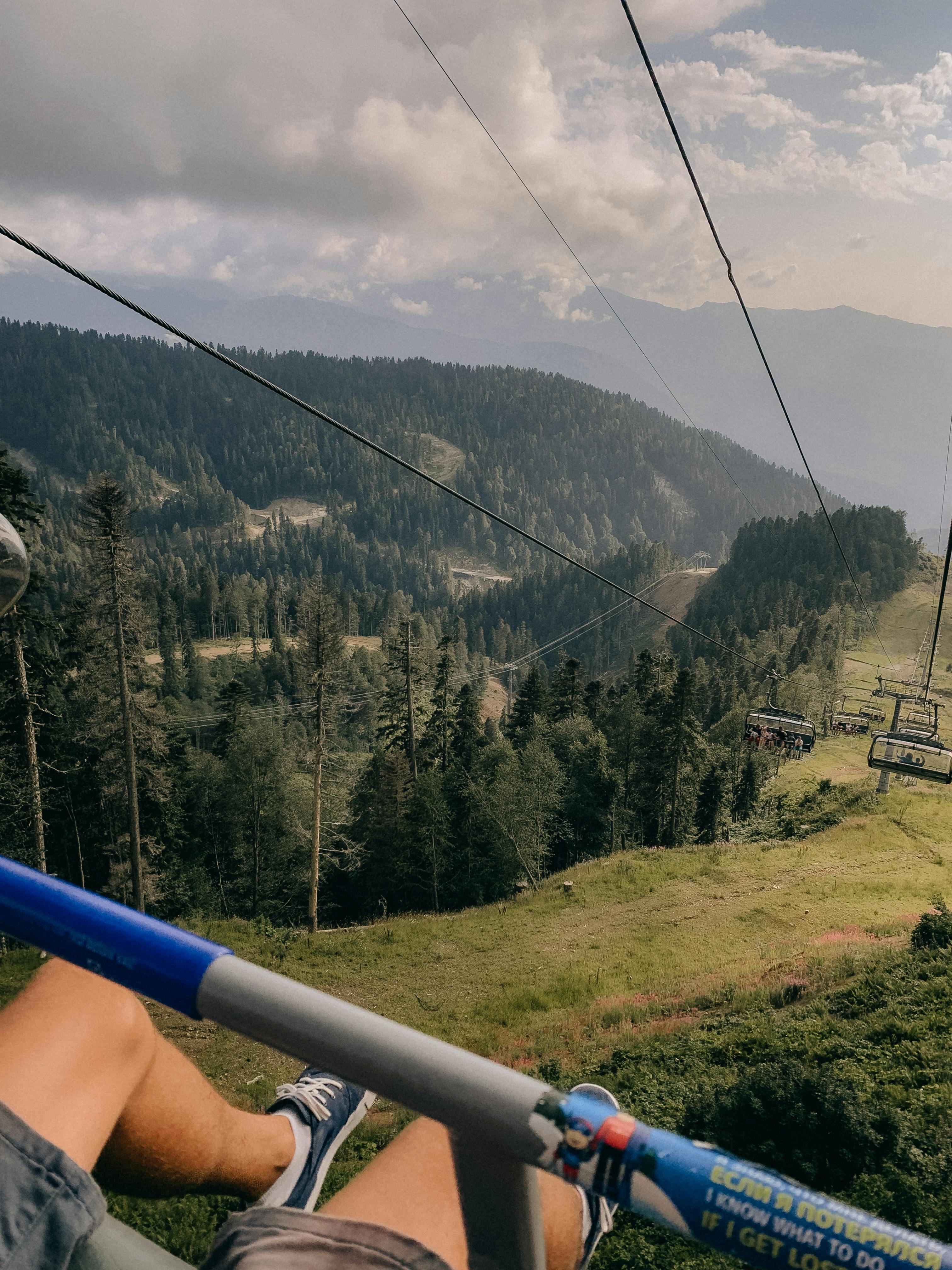 unrecognizable man in funicular on cable railway