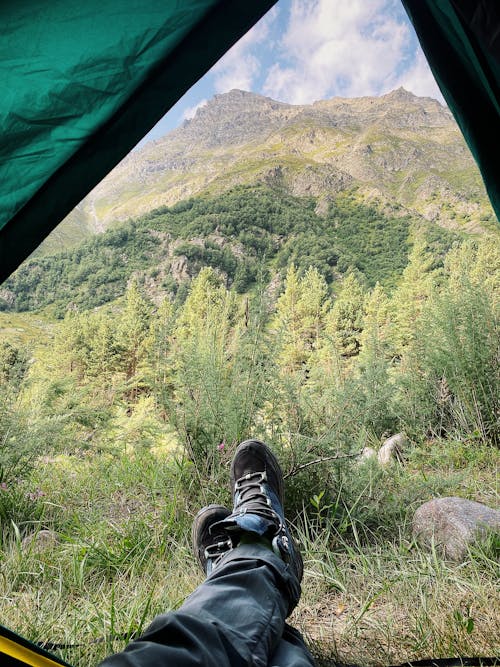 A Person Camping in the Mountain