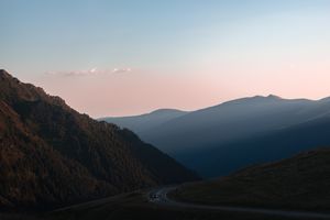 Winding mountain road at sunset by Iulian Patrascu on Pexels