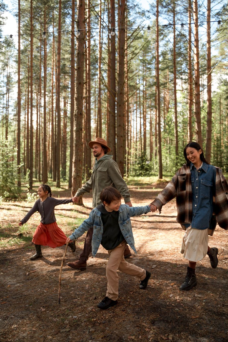 Family exploring a woodland trail together