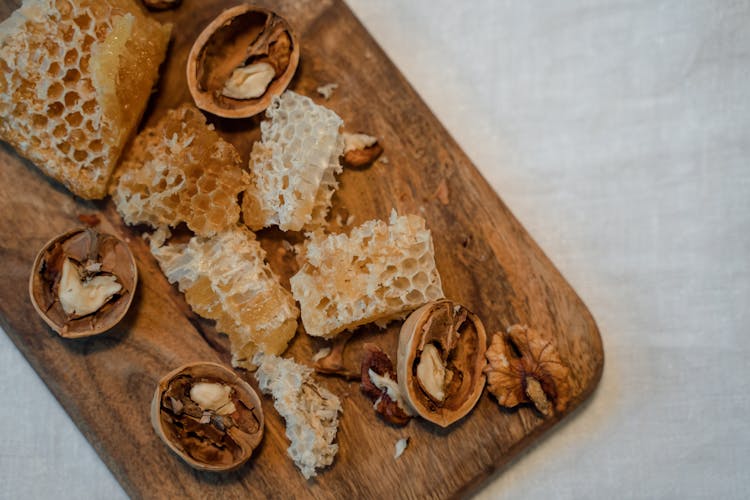 Honeycomb On Wooden Chopping Board