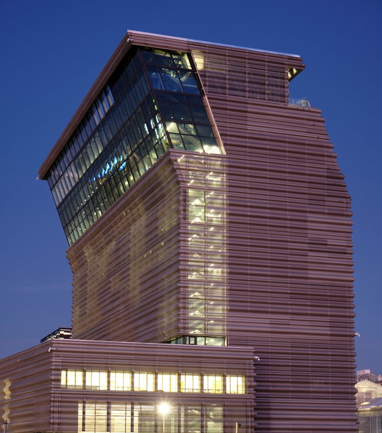 Modern Office Building On Blue Night Sky