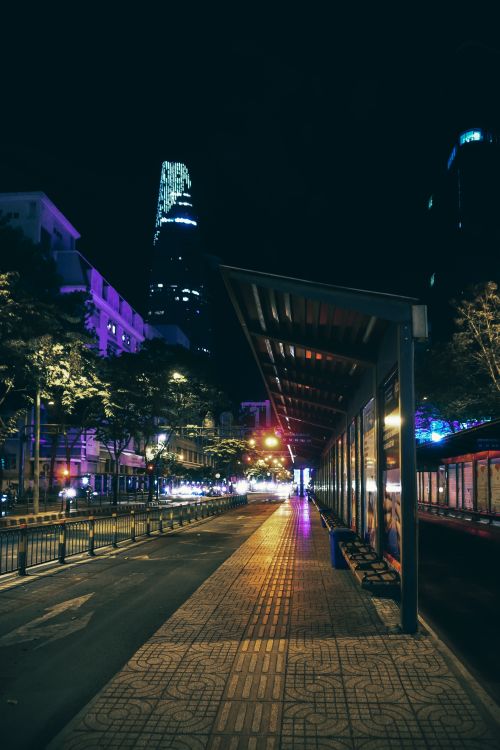 Free Explore the vibrant nightlife on an illuminated sidewalk in Ho Chi Minh City, Vietnam. Stock Photo
