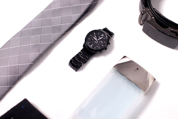 Close Up Of Watch And Tie