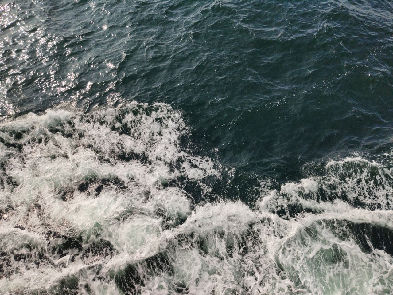 dynamic aerial shot capturing the power and beauty of ocean waves cras
