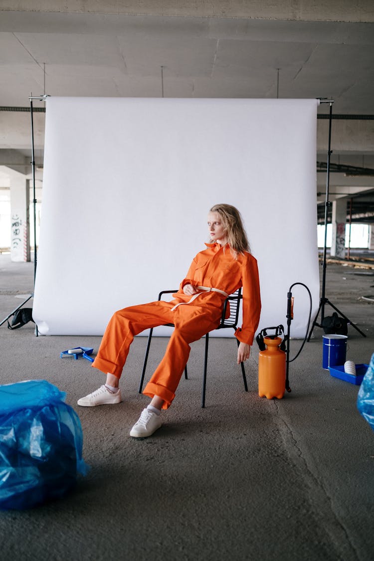 A Woman Wearing Orange Suit