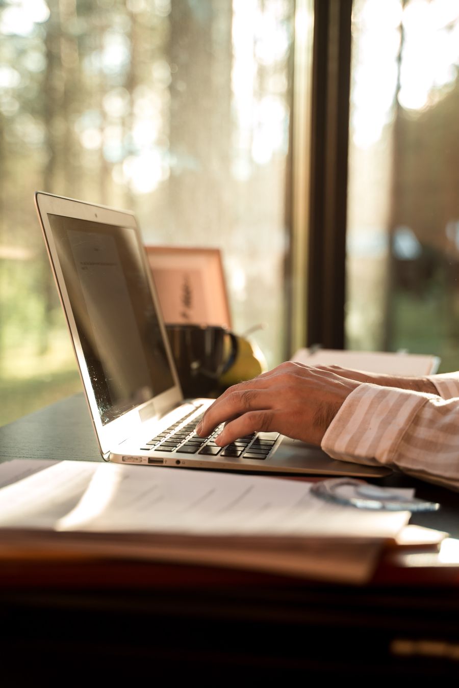 Professional preparing for an interview on a laptop