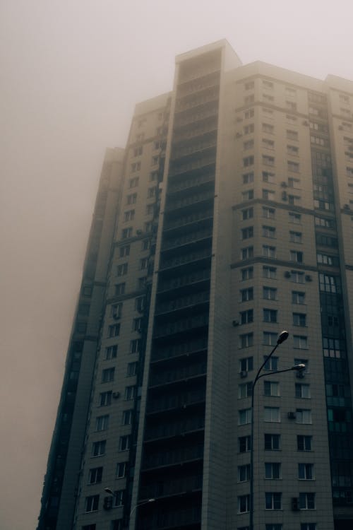 Free Photo of Concrete Building On A Foggy Day Stock Photo