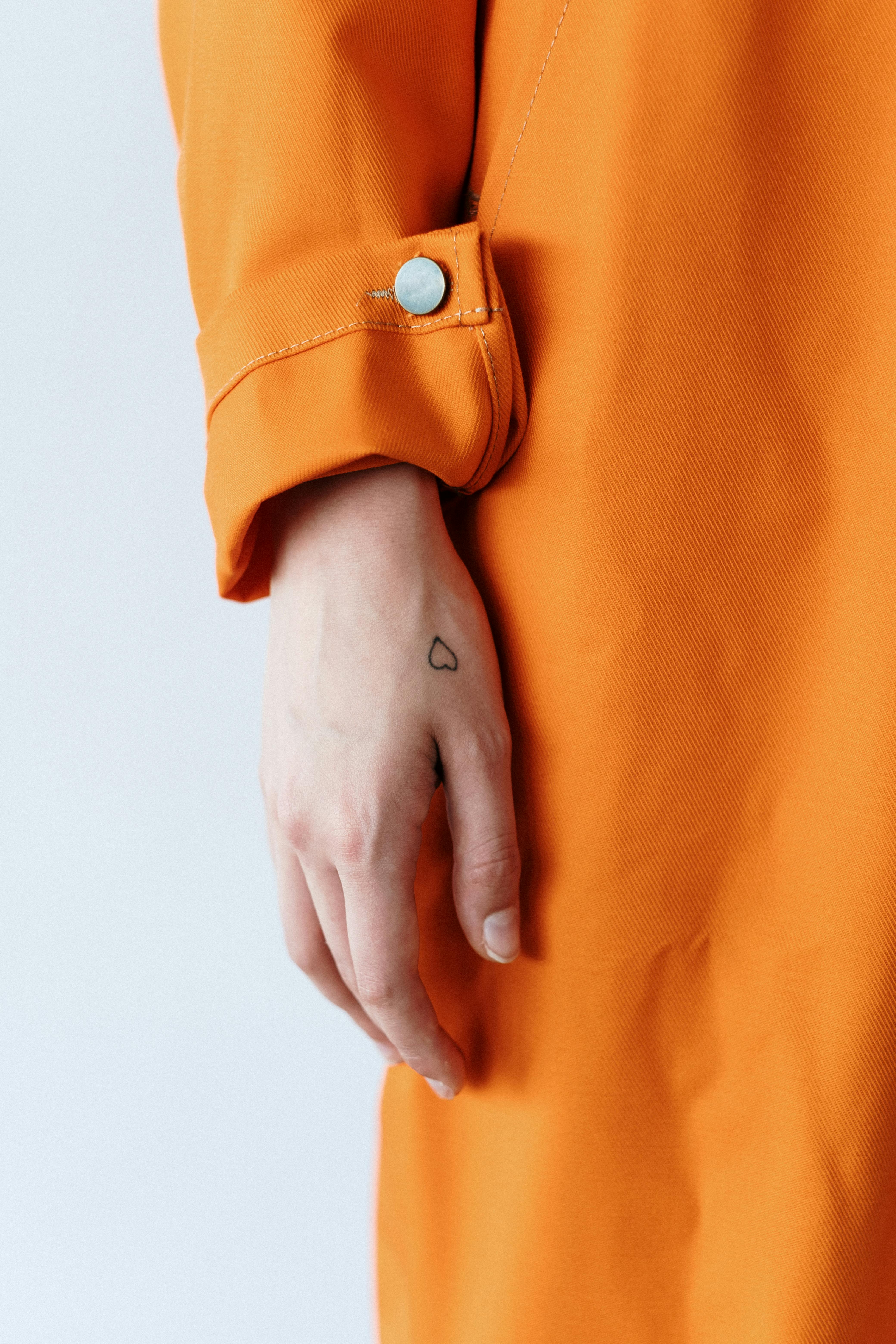 Person in Orange Button Up Shirt · Free Stock Photo