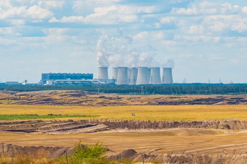Free Landscape view of coal power plant emitting steam with industrial towers in Munich, Germany. Stock Photo