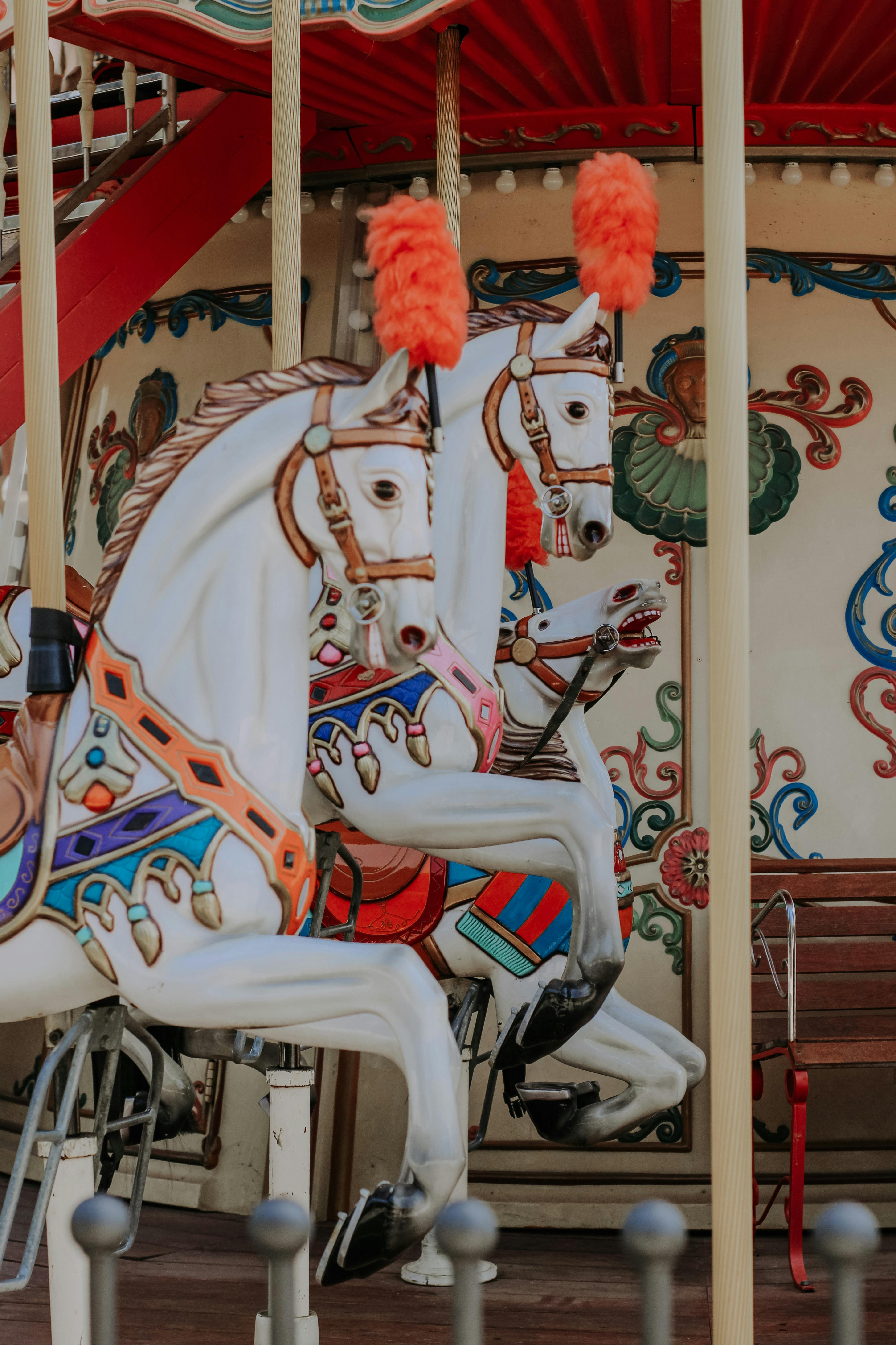White Plastic Carousel Horses · Free Stock Photo