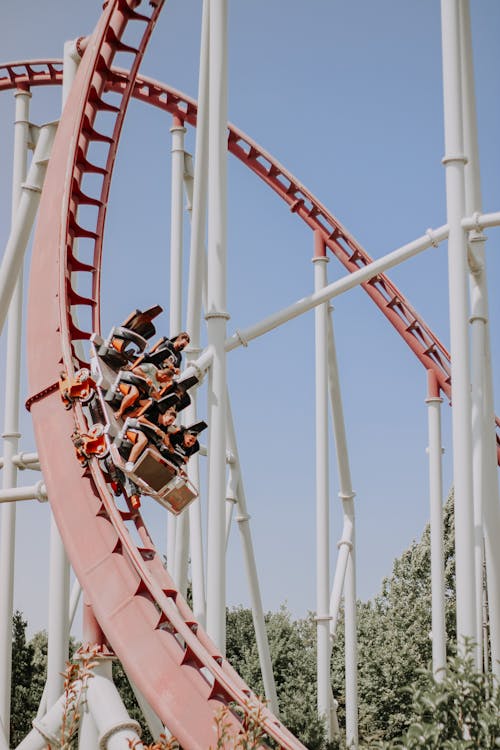 Free People Riding a Roller Coaster Stock Photo