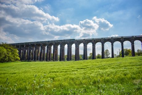 Ouse Valley Viaduct arching across a lush green valley — photo by Valentina Nicola on Pexels