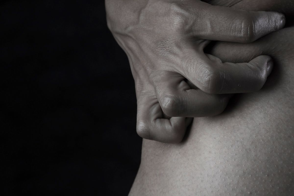 Hand on skin — itching