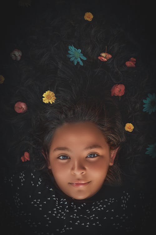 Girl with Flowers on Her Hair