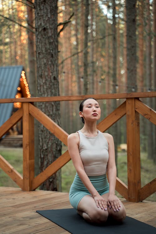 Woman Meditating Outdoors 