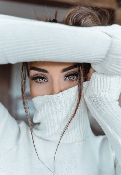 Free Beautiful Woman in White Sweater Stock Photo