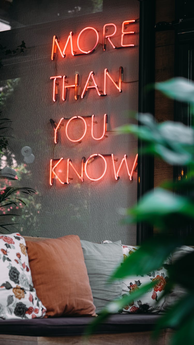 Red Neon Lights Signage On Gray Wall