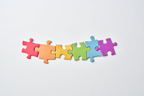 Free Connected Puzzle Pieces In Close Up View Stock Photo