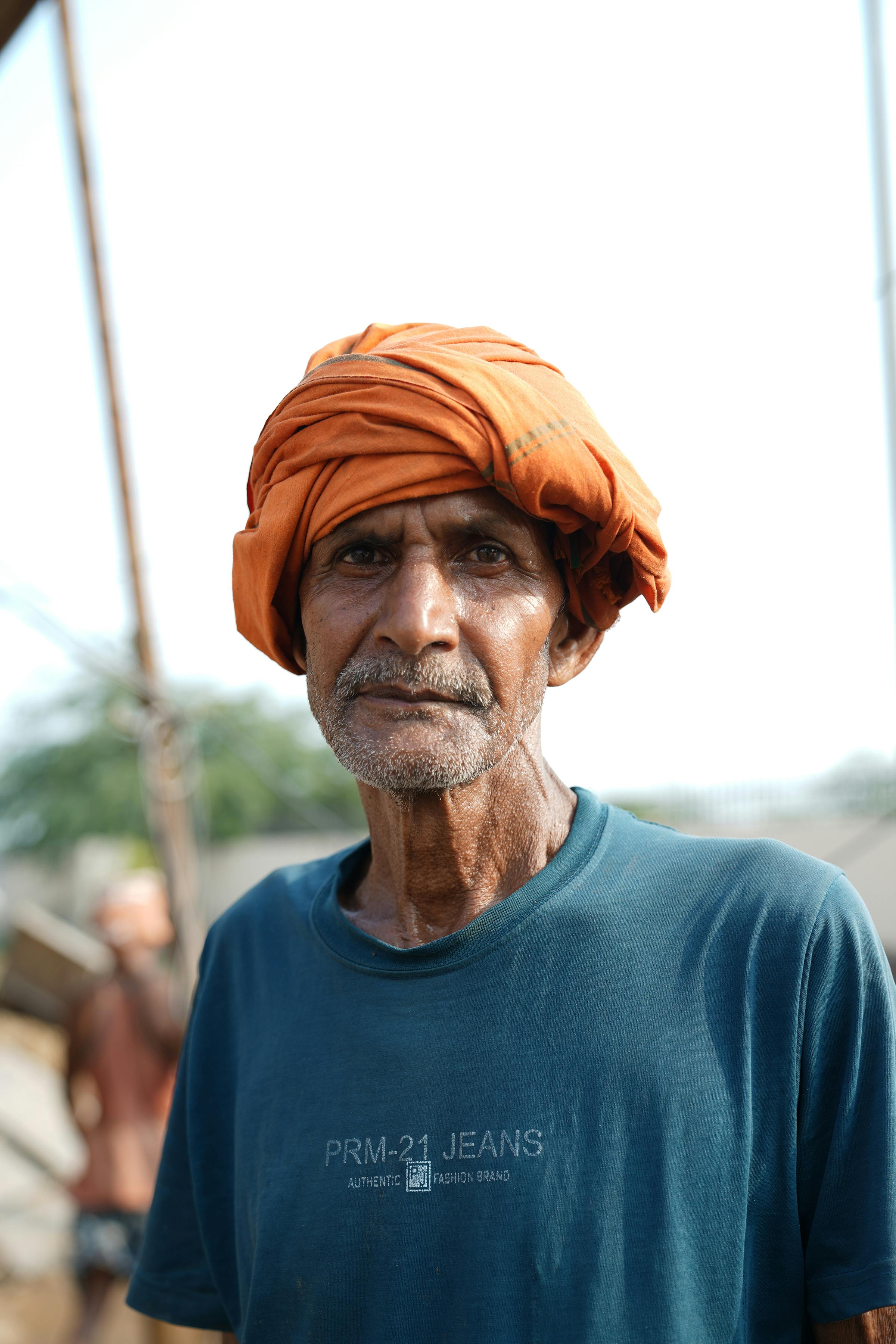 old man in headwear outdoors