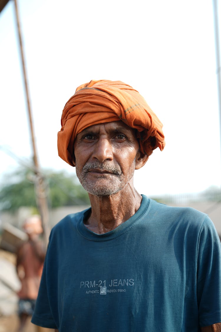 Old Man In Headwear Outdoors