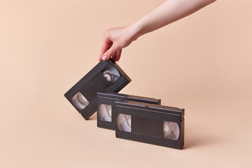 Безкоштовне стокове фото на тему «VHS, бежевому фоні, всередині»