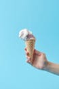 Person Holding Ice Cream Cone