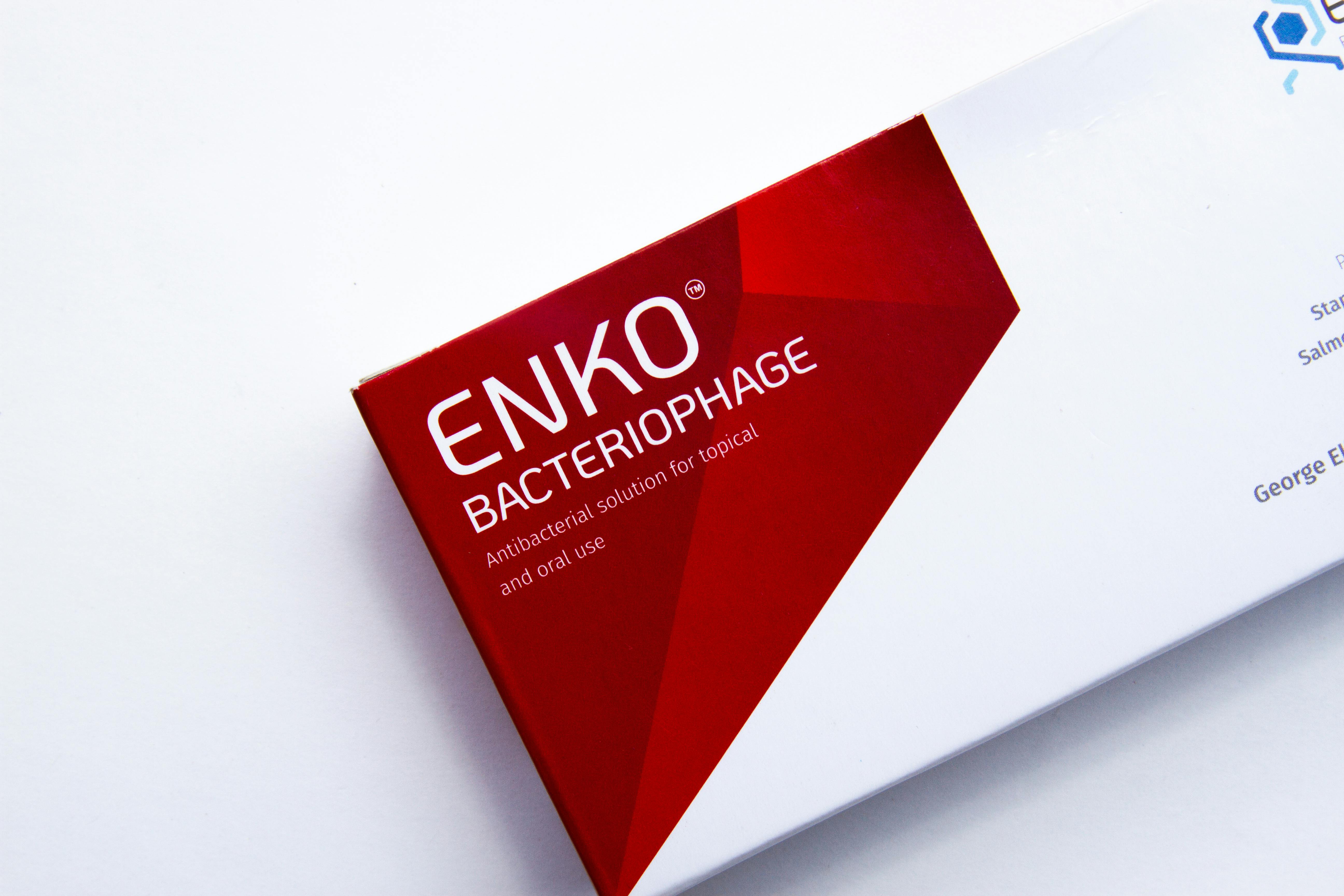 Close-up of ENKO bacteriophage antibacterial solution packaging on white background.