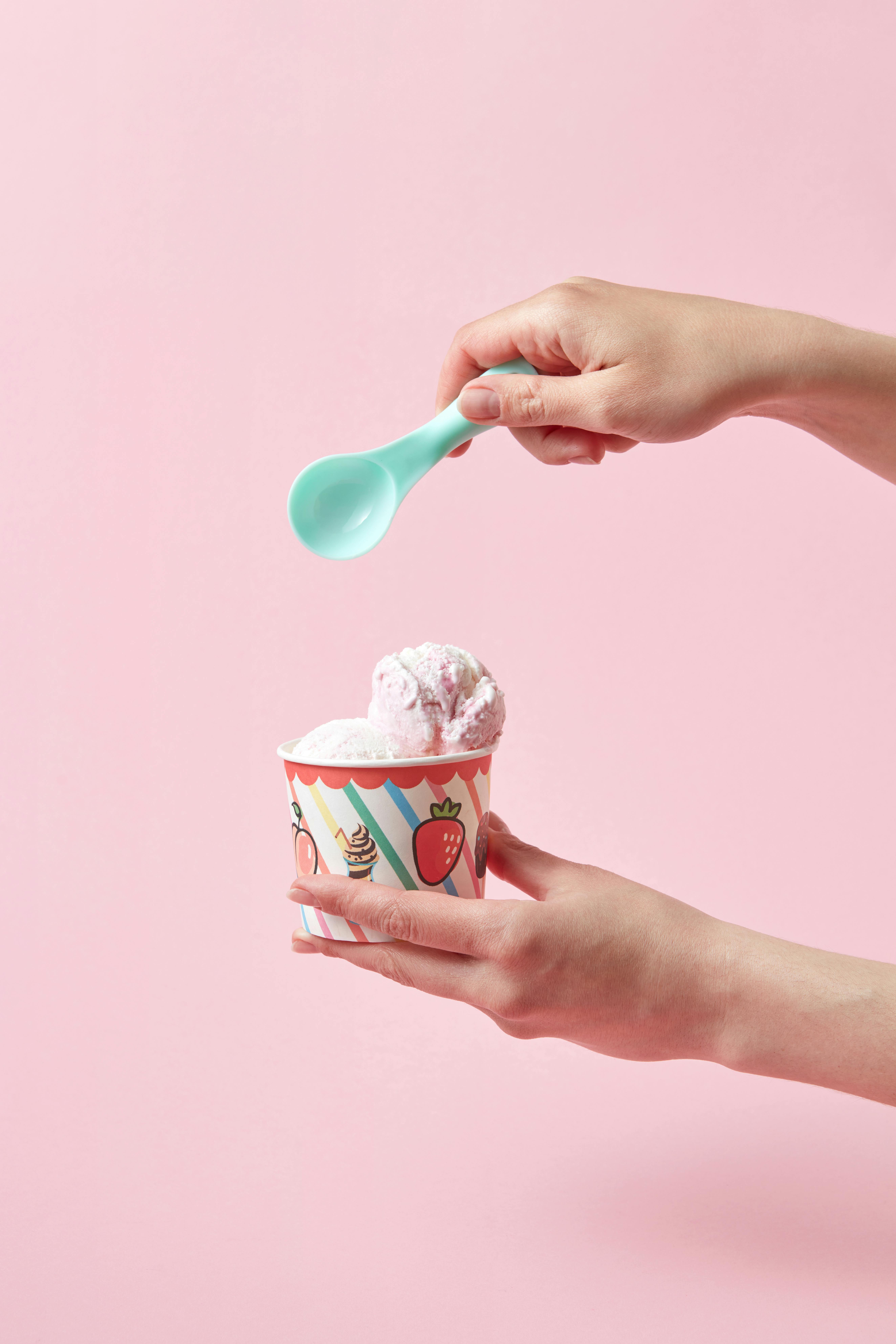 Person Holding a Paper Cup with Ice Cream · Free Stock Photo